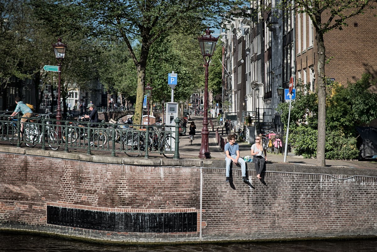 Relax on Amstel bank in Amsterdam