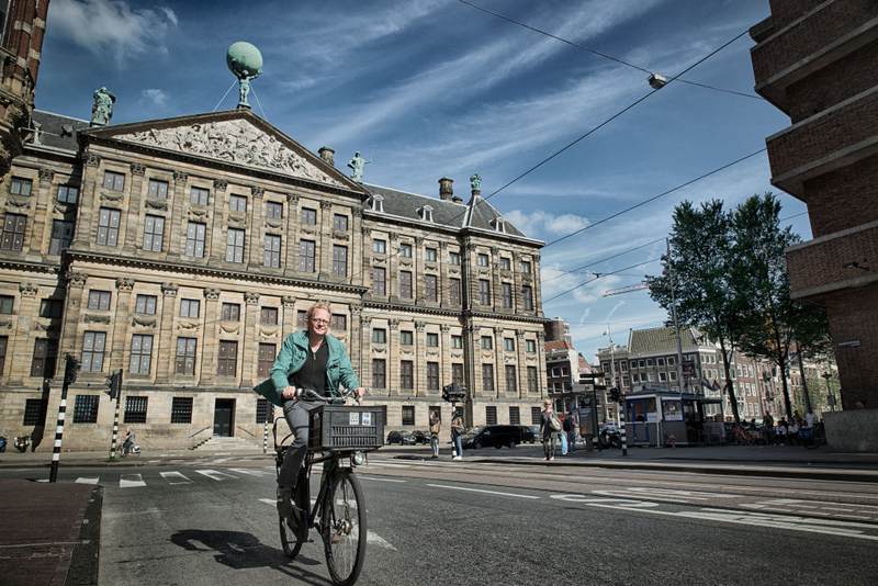 Man riding bike in Amsterdam