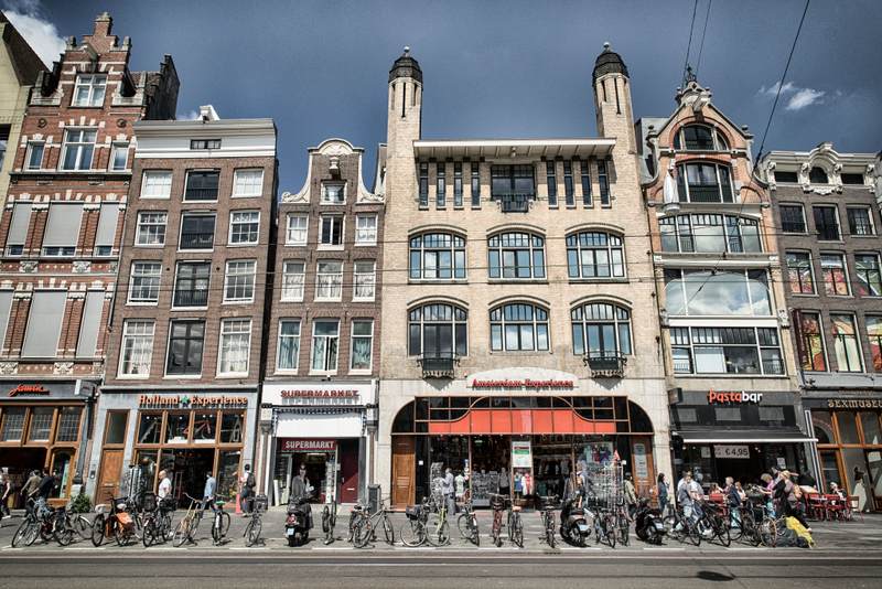 Amsterdam building with bikes in front