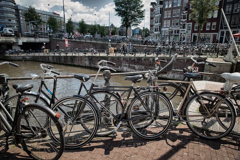 Bikes parked near Amsterdam canal